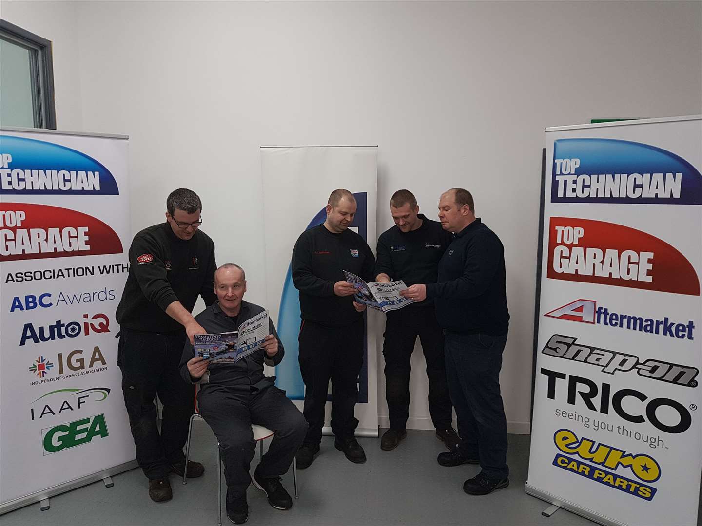 Murdo Macleod (seated) with other semi-finalists in the Top Technician of 2019 competition.