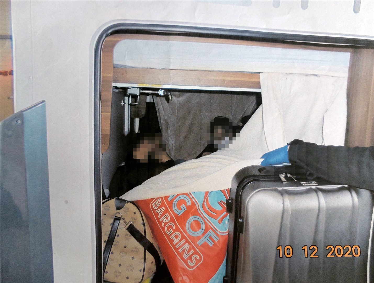 The migrants were found hiding in a motorhome on the French side of the Channel Tunnel (Home Office/PA)