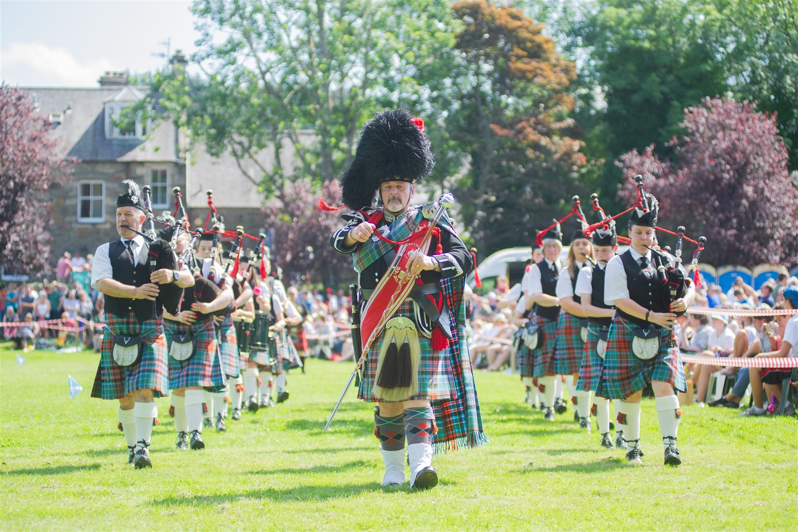 The Strathisla Pipe Band enter the field at the Aberlour Highland Games last year. Picture: Daniel Forsyth.