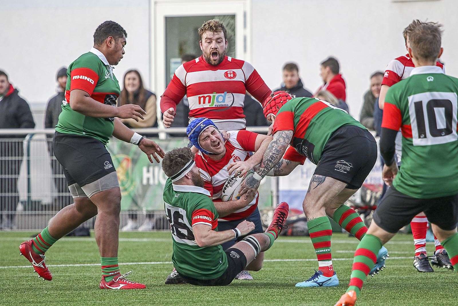 Moray's David Clarke tackled with Calum Smith in support. Photo: John Macgregor
