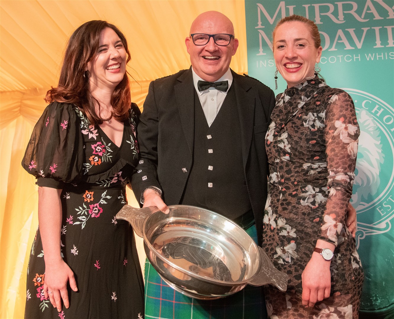 Tamdhu Distillery Manager Sandy McIntyre is awarded the Ambassdor of the Year award from Lauren Murray (left) and Steph Murray.Picture: Daniel Forsyth