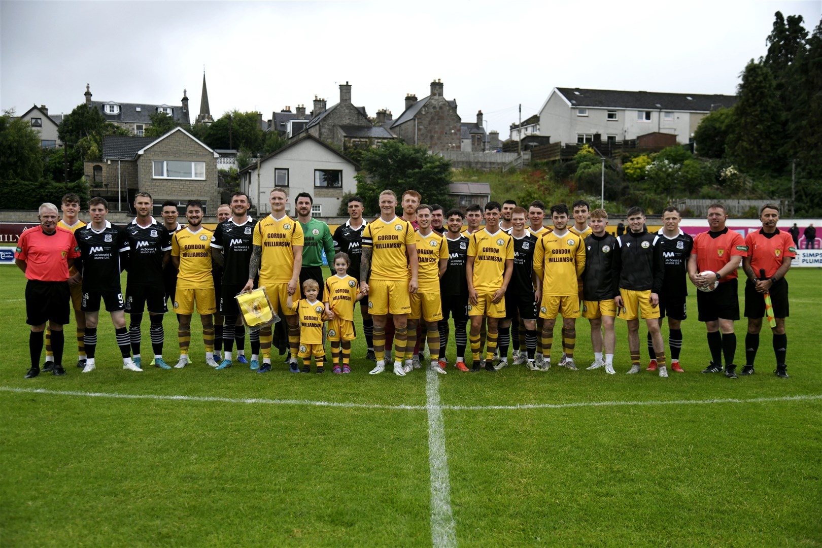 The teams line up for the Fraser twins' testimonial match. Picture: Beth Taylor.