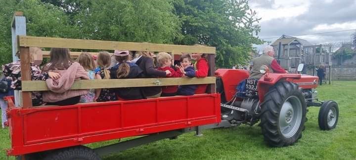 Tractor and trailer rides from Willie Greenlees, from Lhanbryde, proved very popular.