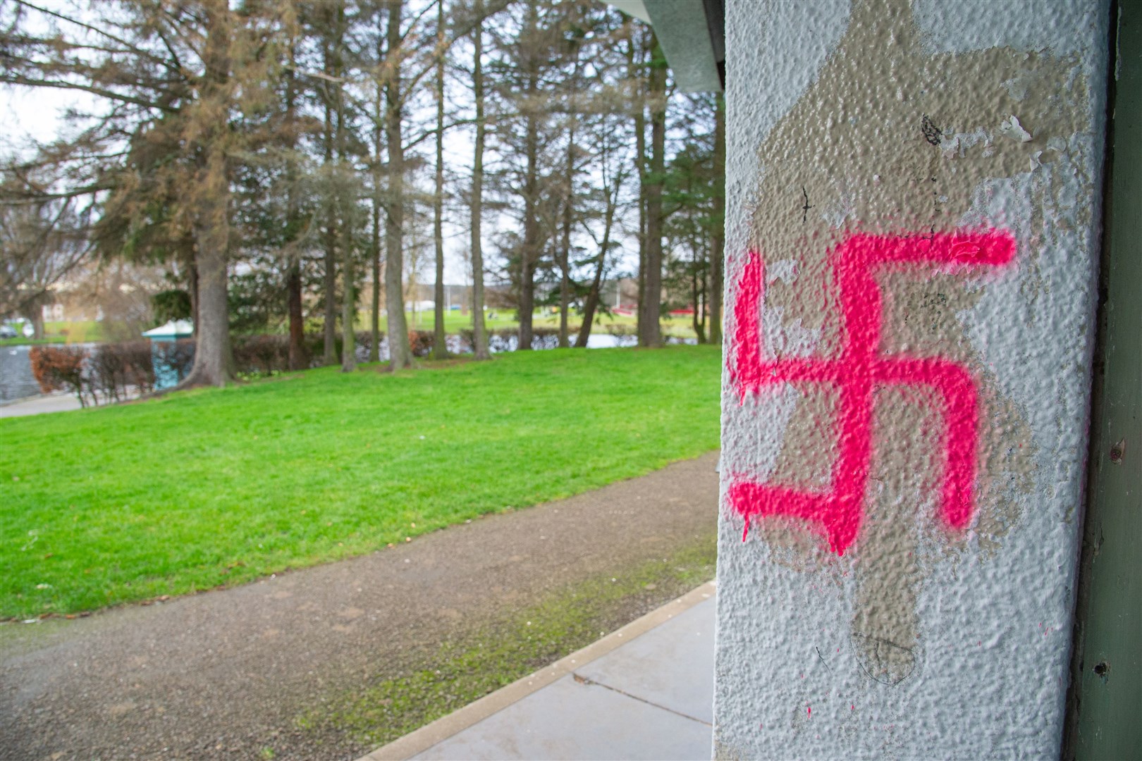 Graffiti, including a swastika, has been sprayed on the Cooper Park Pavillion - which had just been re-painted in the 2019 summertime by school pupils. Picture: Daniel Forsyth
