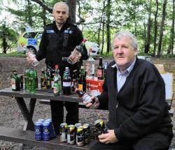 Constable Ian Moeller and Colin Murray at the scene of the drinking den