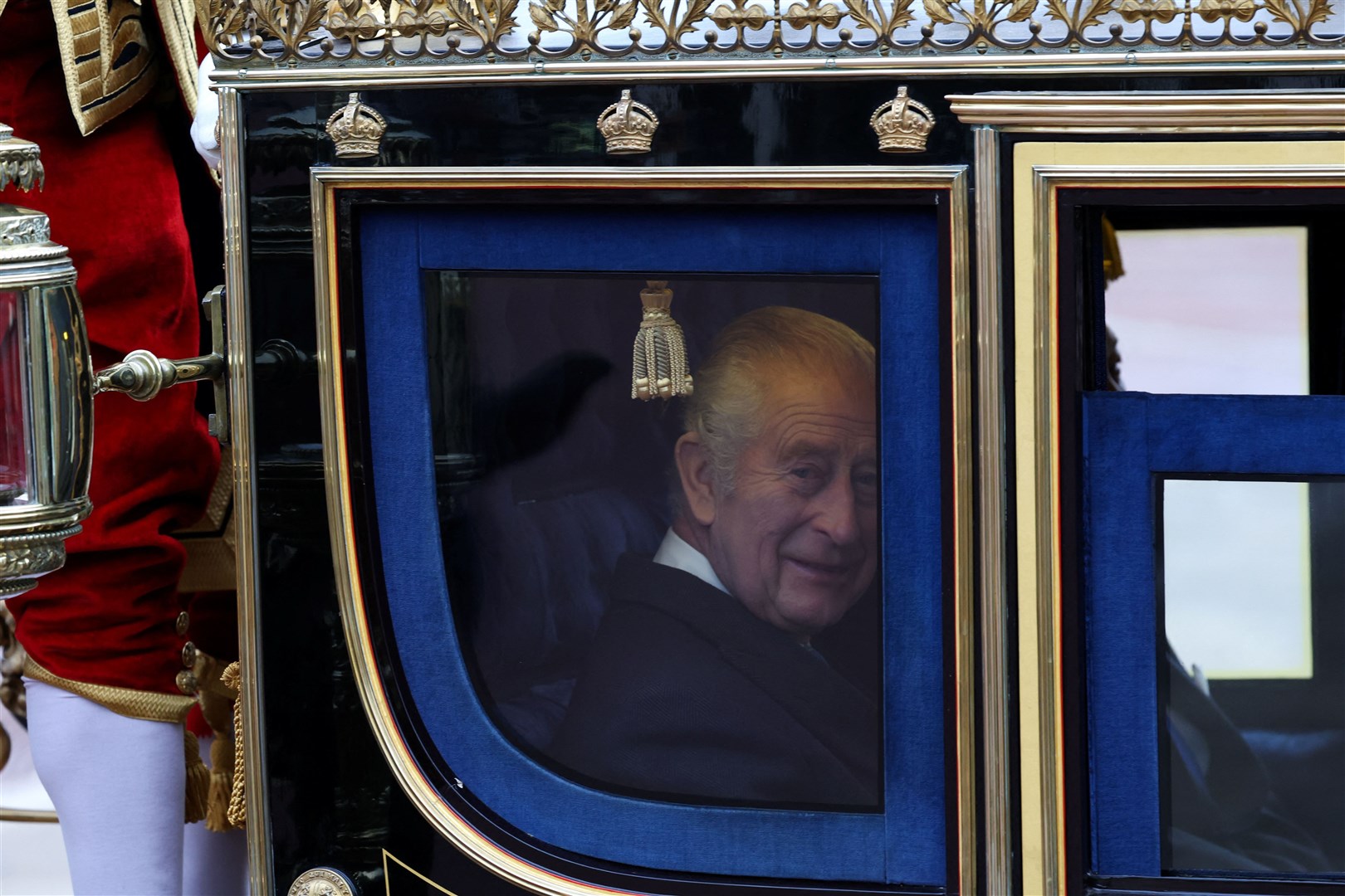 The King travelling by carriage from Horse Guards to Buckingham Palace (Hannah McKay/PA)