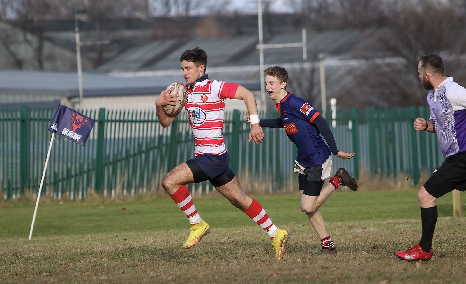 Rory Millar on his way to scoring a try