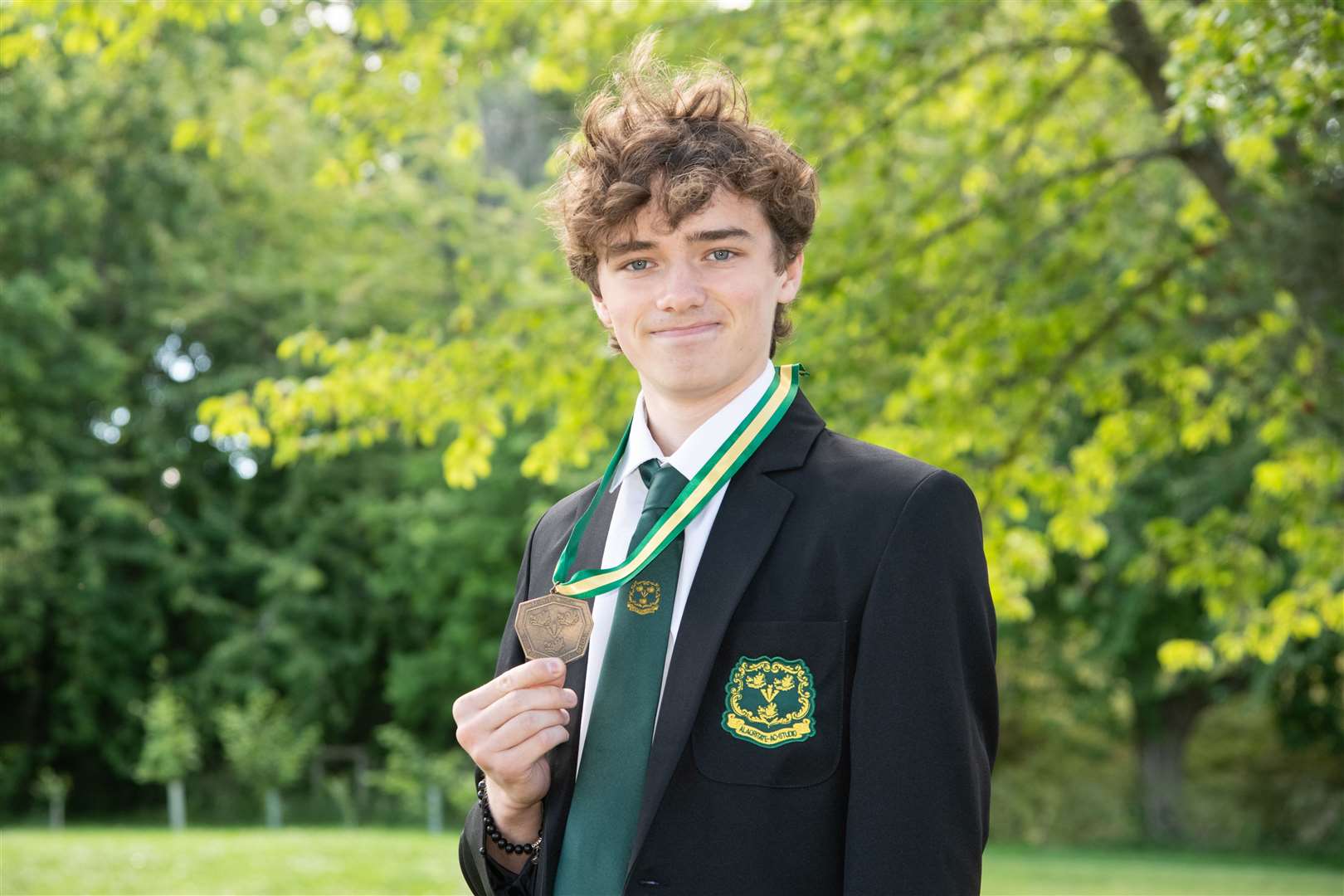 S5 Dux at Milne's High School Joshua Ward proudly shows off his Sir Ashley Mackintosh Medal. Picture: Daniel Forsyth