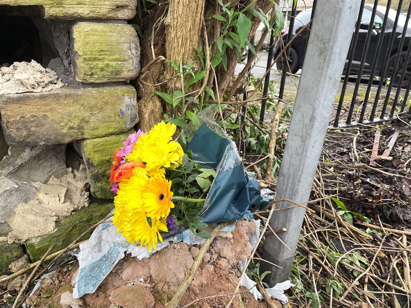 Flowers at the scene in Bradford city centre where a young woman was stabbed to death (Dave Higgens/PA)