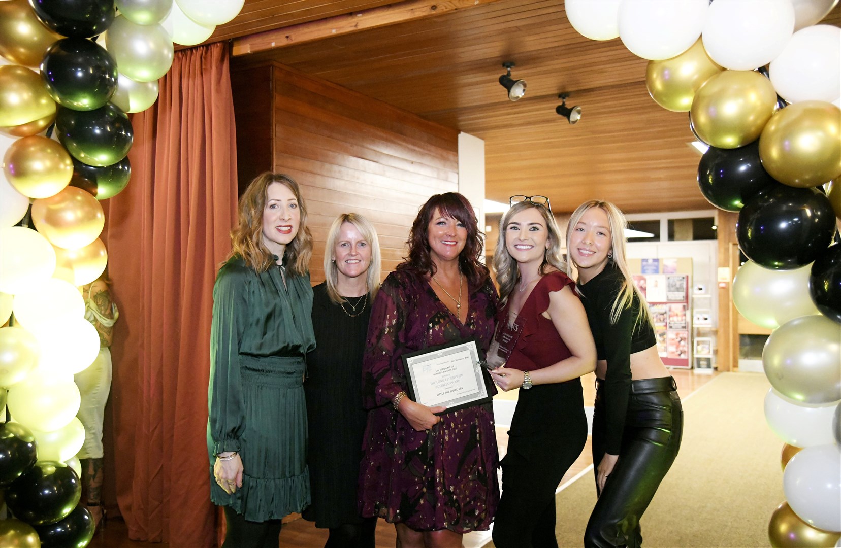 Karen Mackay (centre) and the team from Little the Jeweller who won the long established business award. Picture: Beth Taylor