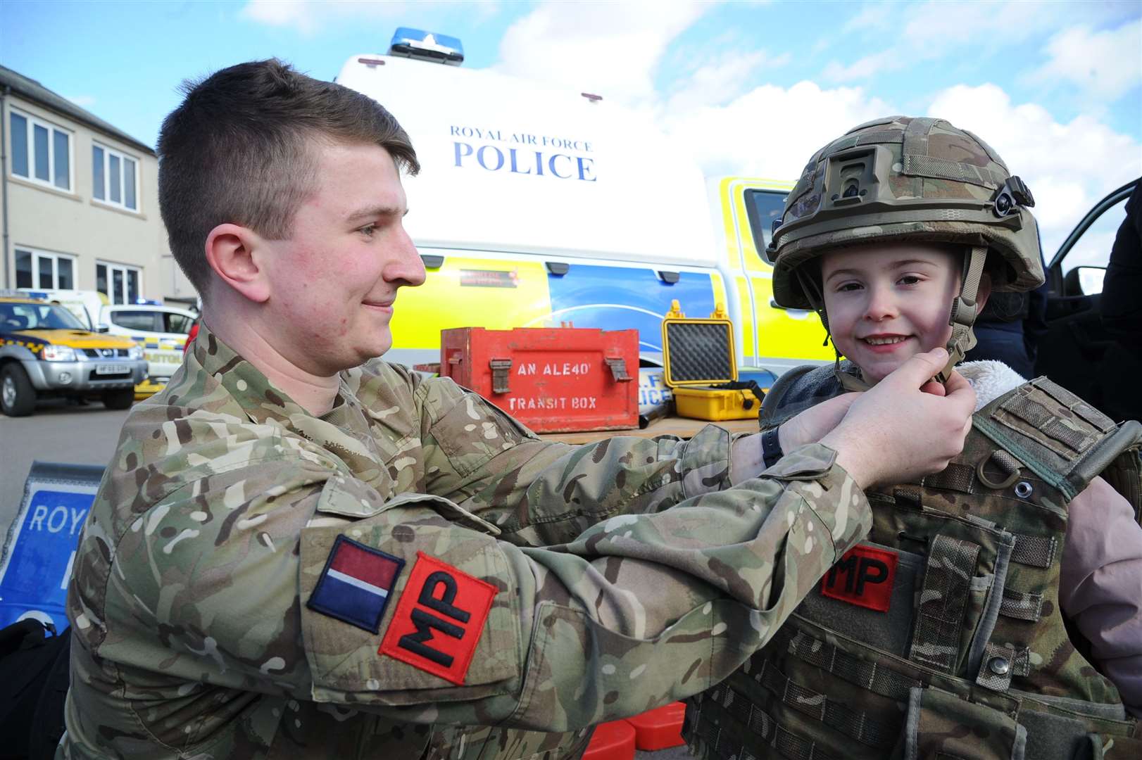 Ruby Williamson gets kitted out by RAF Police Cpl Ollie Jewers at the festival in 2019.