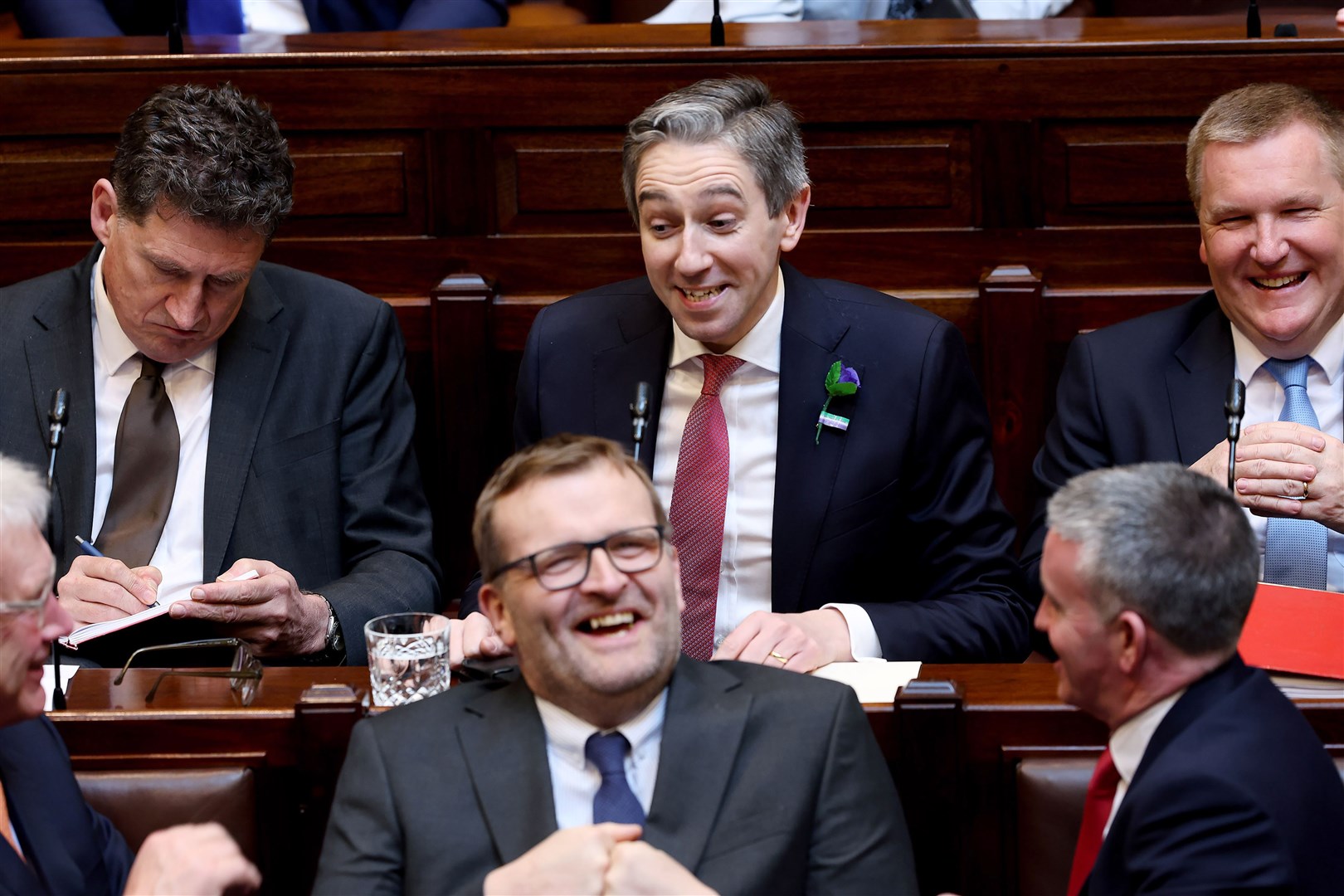 Fine Gael leader Simon Harris (centre) in the Dail Chamber, Leinster House, Dublin ahead of being nominated as Taoiseach (Maxwell Photography/PA)