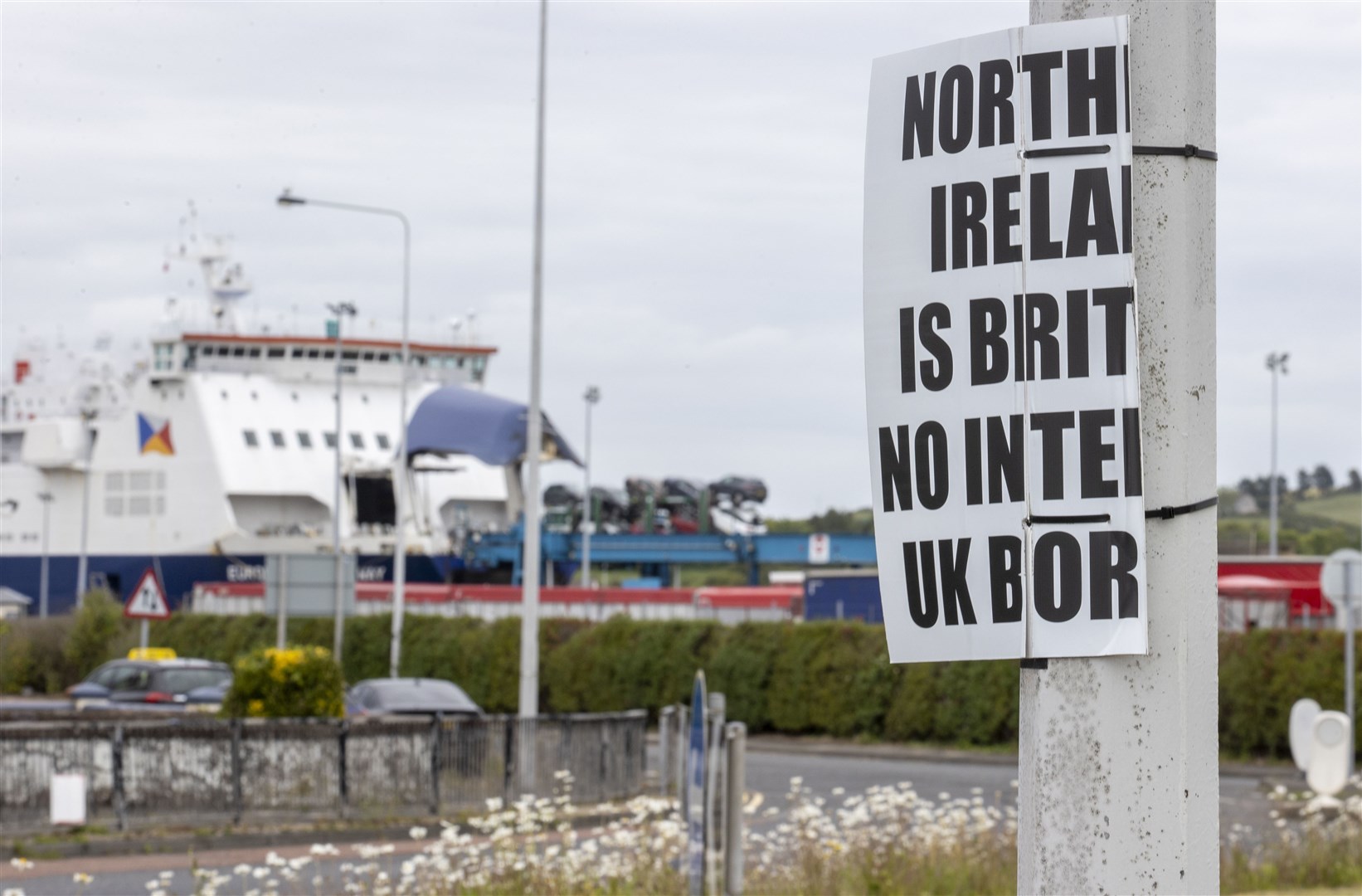 An anti-Northern Ireland Protocol sign close to Larne Port (Liam McBurney/PA)