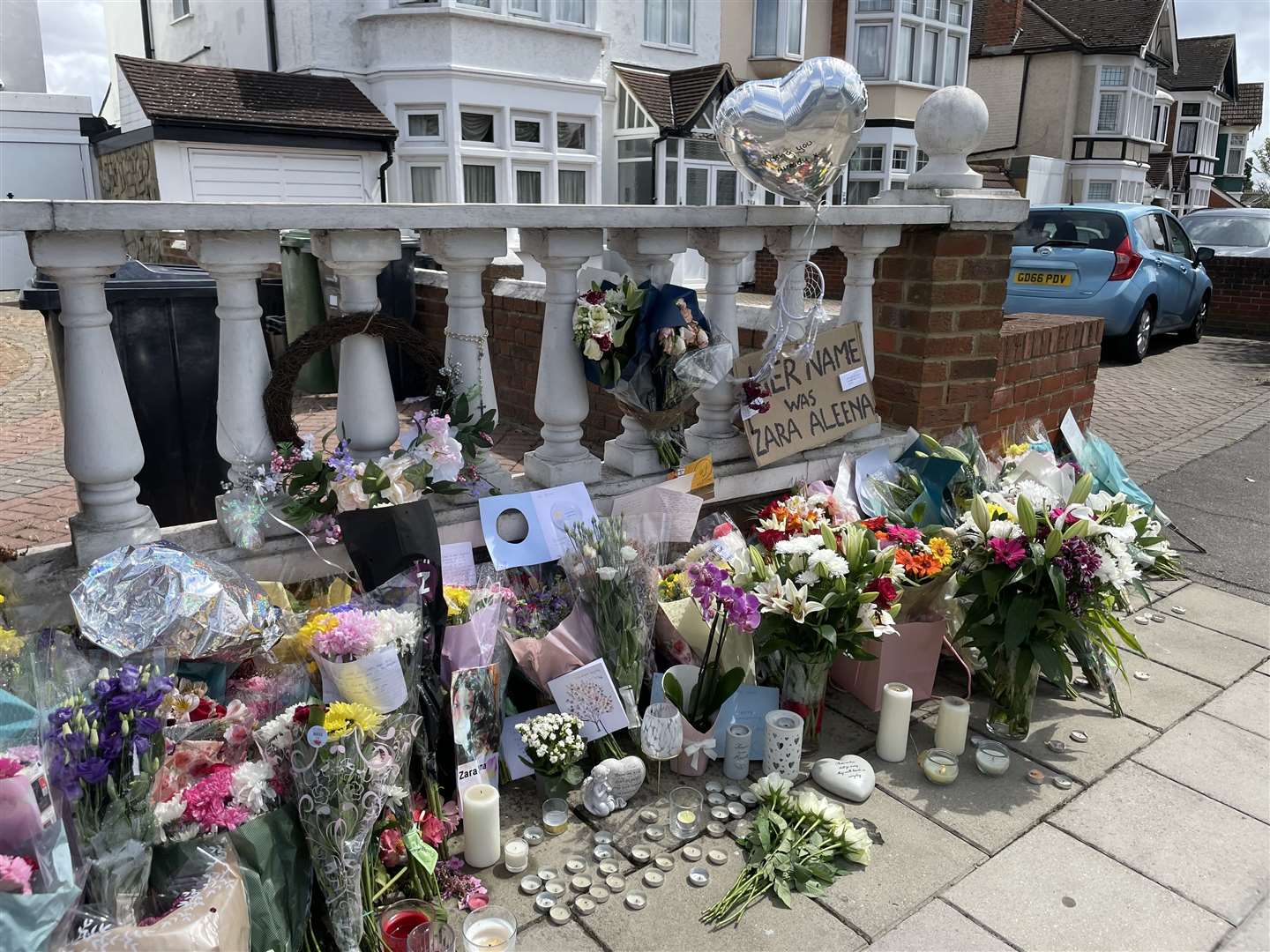 Floral tributes left at the scene on Cranbrook Road in Ilford, east London, where Zara Aleena, 35, was murdered (Ted Hennessey/PA)