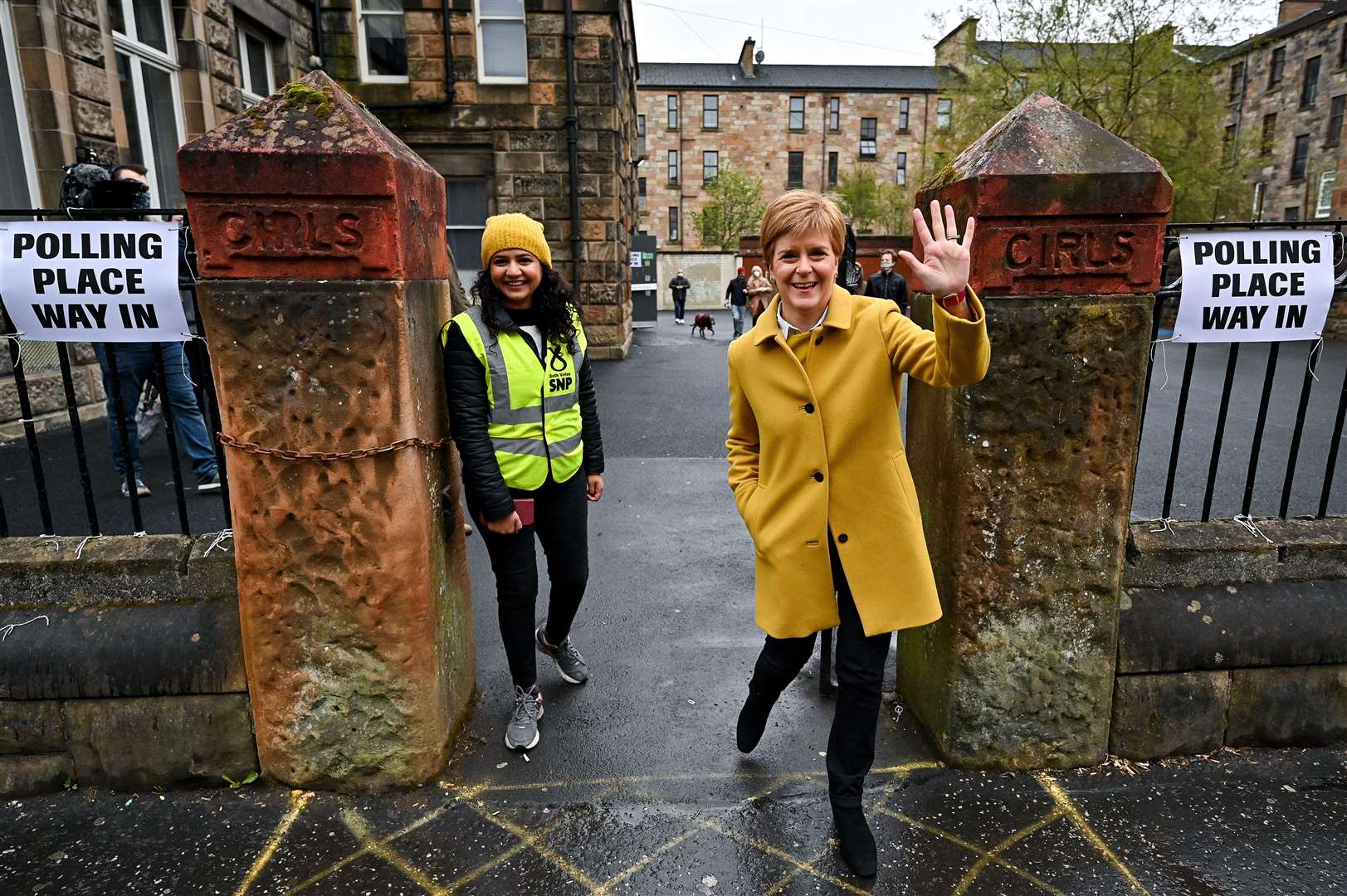 Nicola Sturgeon and SNP candidate Roza Salih were at a polling station in Glasgow (Jeff J Mitchell/PA)