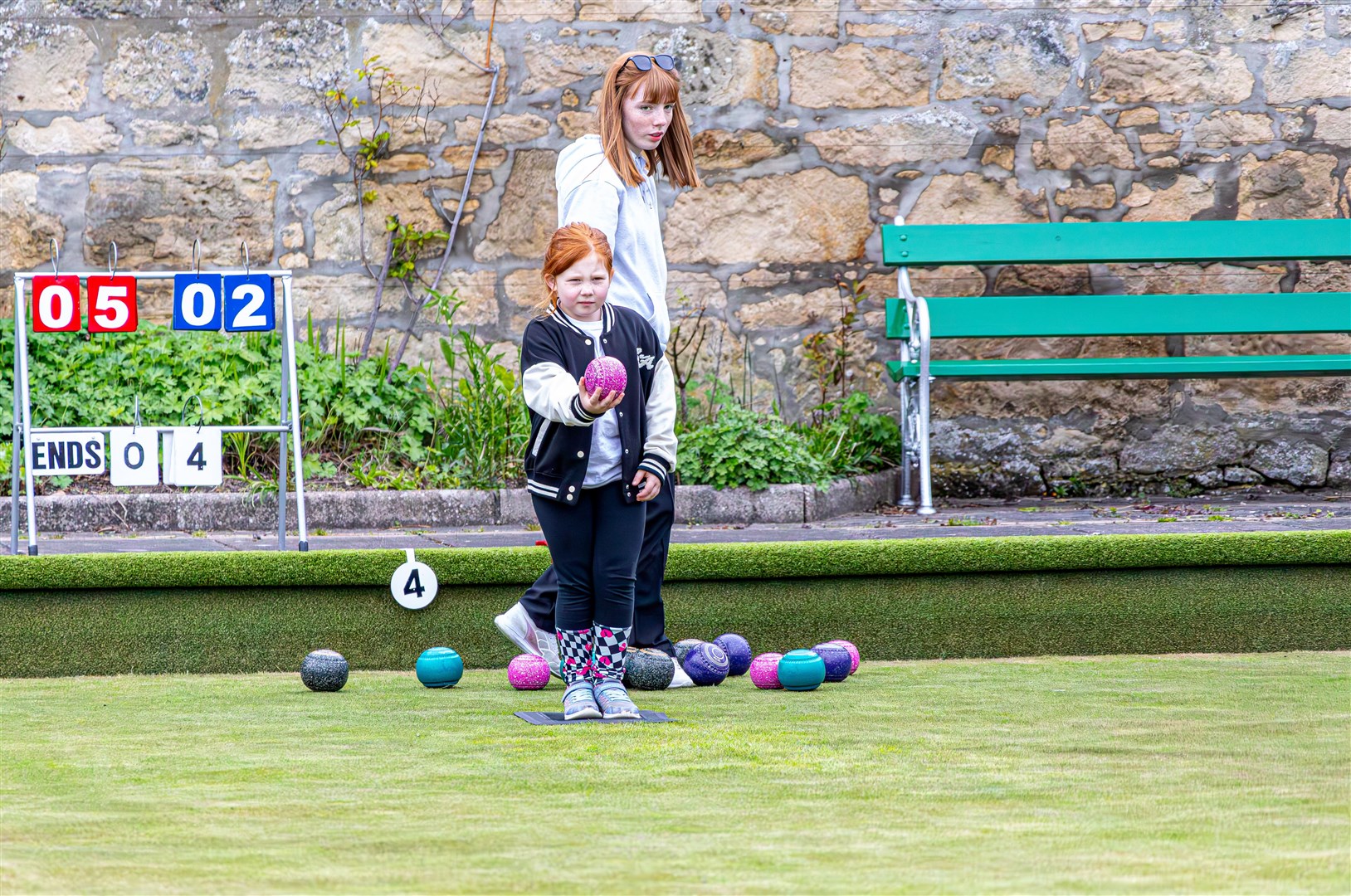 Showing age is no barrier at The Elgin Bowling Club, junior members Aimee and Bronagh get involved in the action.