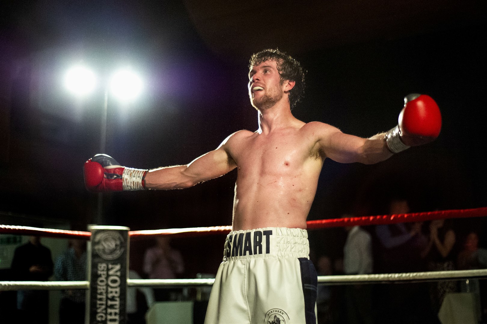 Andrew Smart celebrates victory in his third professional fight in Elgin two years ago. Picture: Daniel Forsyth..