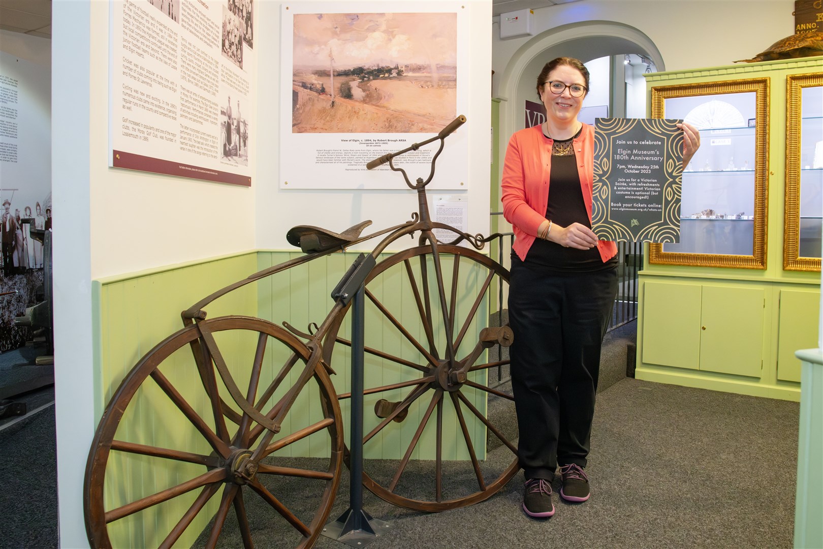 Claire Herbert with a Victorian 'bone-shaker' bicycle, one of the many fascinating exhibits at Elgin Museum. Picture: Beth Taylor