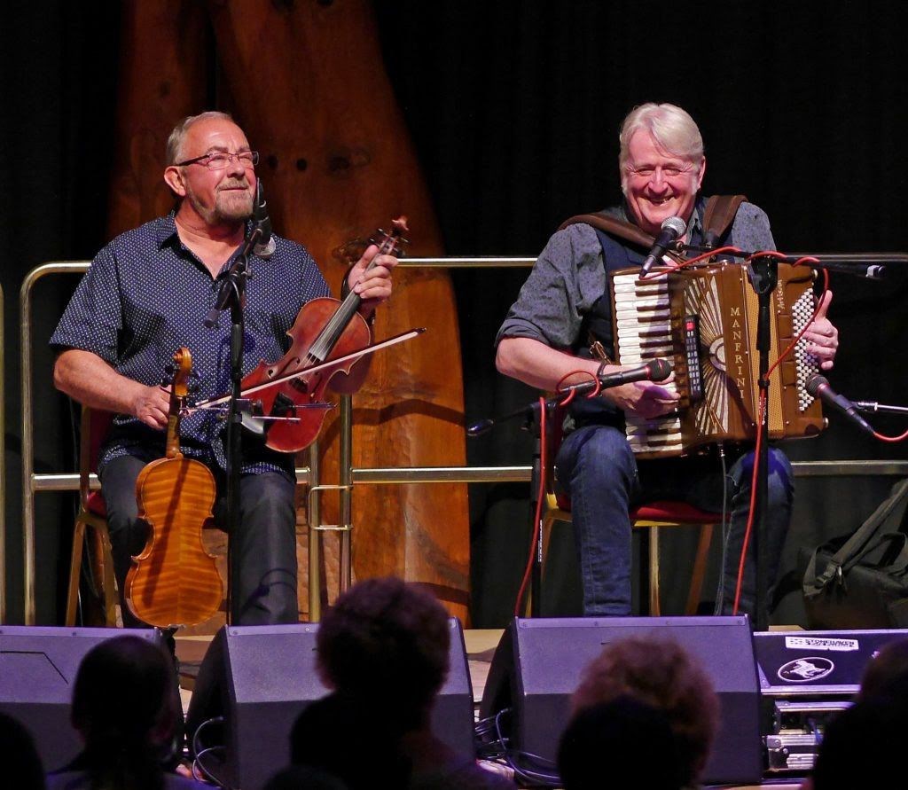 Fiddle player Aly Bain alongside his long-time musical partner Phil Cunningham.