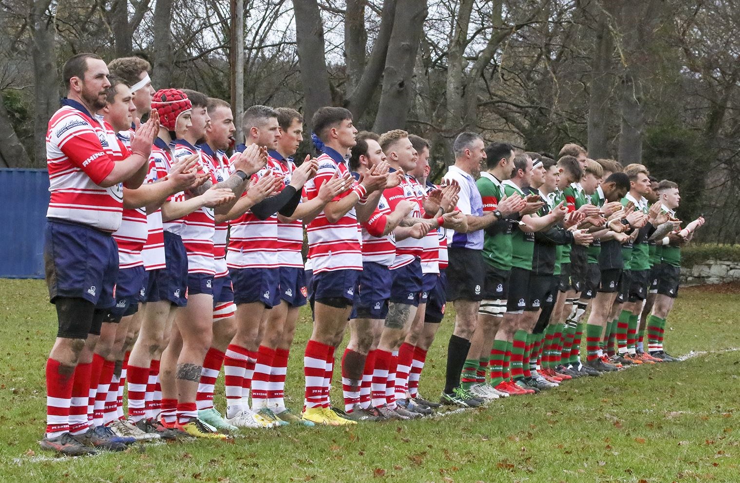 Players from both teams and referee join in the one-minute clapping in memory of Doddie Weir. Picture: John MacGregor