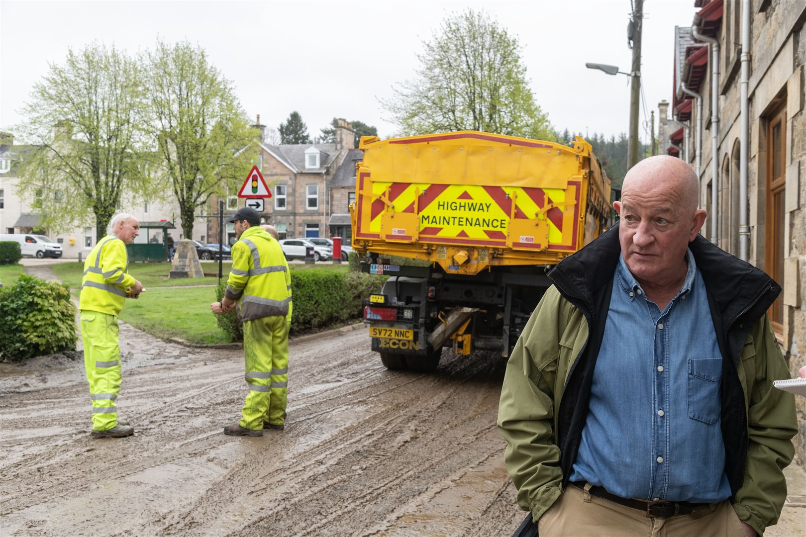 Councillor for Speyside Glenlivet, Derek Ross looking concerned at the damage caused by the floods leaving Aberlour Parish Church's surroundings covered in mud. ..Picture: Beth Taylor.