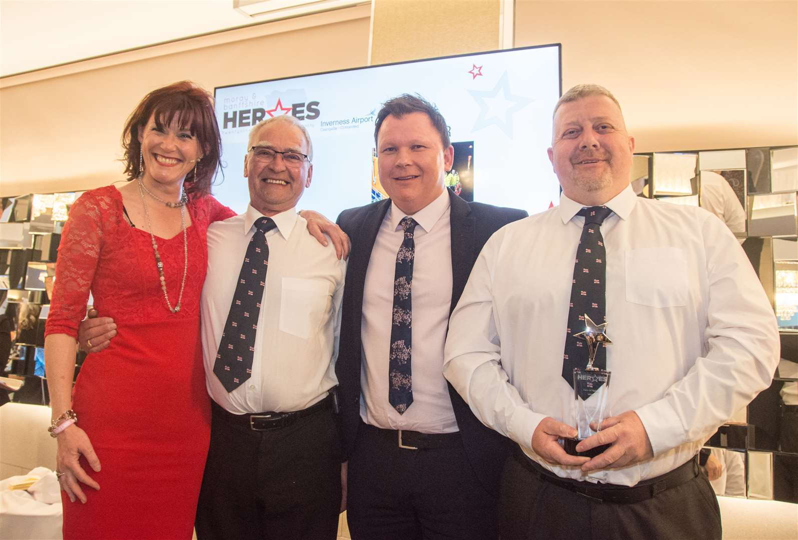 The Buckie RNLI heroes Joe Herd and Dave Grant with Nicky Marr and Dave Main of Springfield. Picture: Becky Saunderson. Image No.043395.