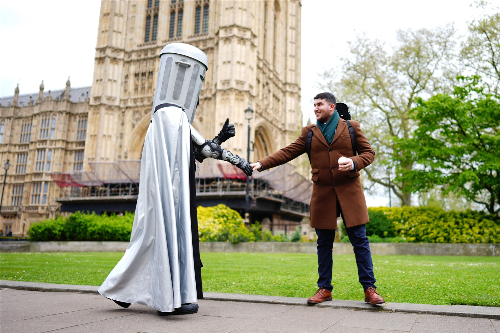 Mayor of London election candidate Count Binface greets an admirer outside Parliament (Aaron Chown/PA)