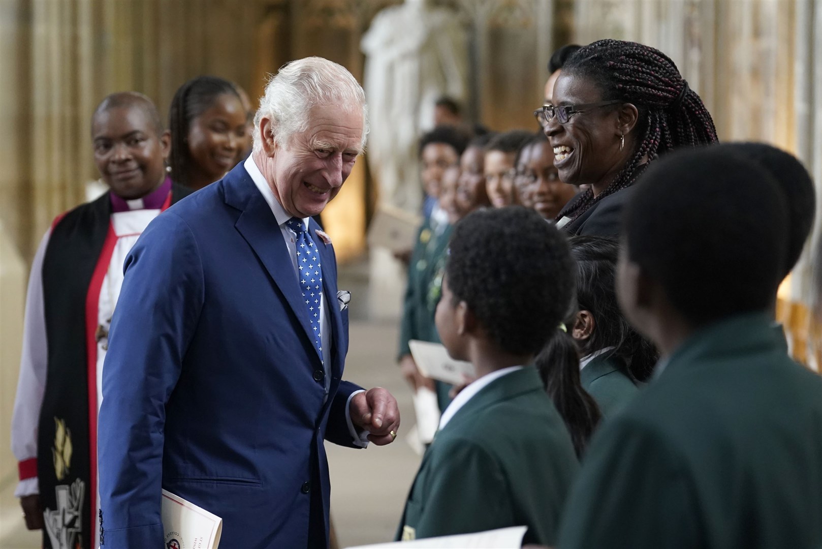 He also spoke to young people in the congregation (Andrew Matthews/PA)