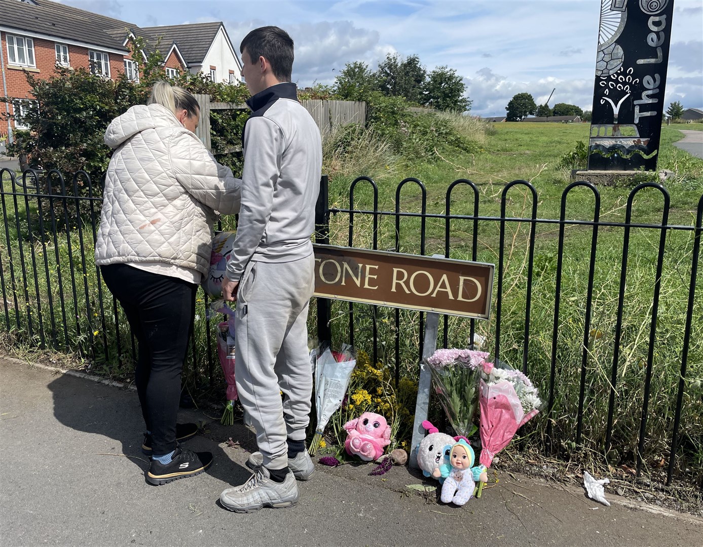 People leave tributes to seven-year-old Katniss Seleznev in Turnstone Road in Walsall (Phil Barnett/PA)