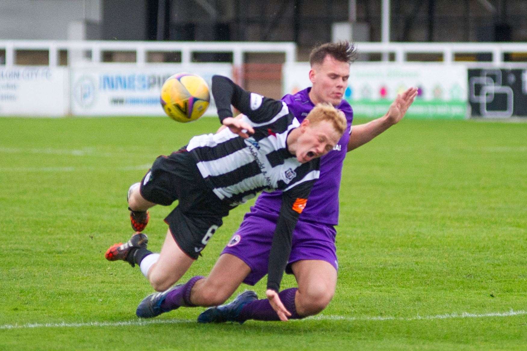 Elgin City's Russell Dingwall is fouled by Stirling Albion captain Jordon McGregor - giving the home side a penalty. ..Picture: Daniel Forsyth..