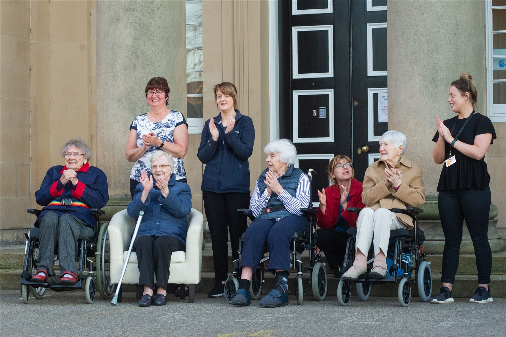 Residents and carers at Elgin care home Anderson's applaud during the UK-wide #clapforcarers at 8pm on Thursday nights. Pictures: Daniel Forsyth