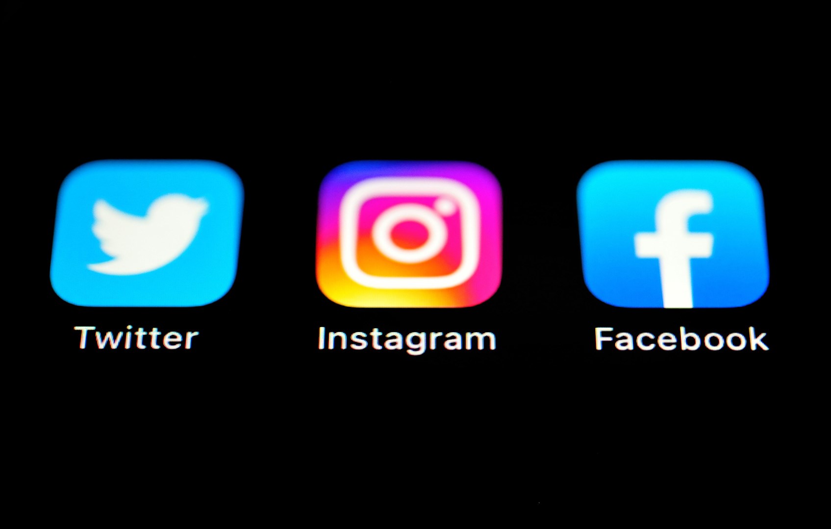 The Twitter, Instagram and Facebook apps on an iPhone screen (Matthew Vincent PA)