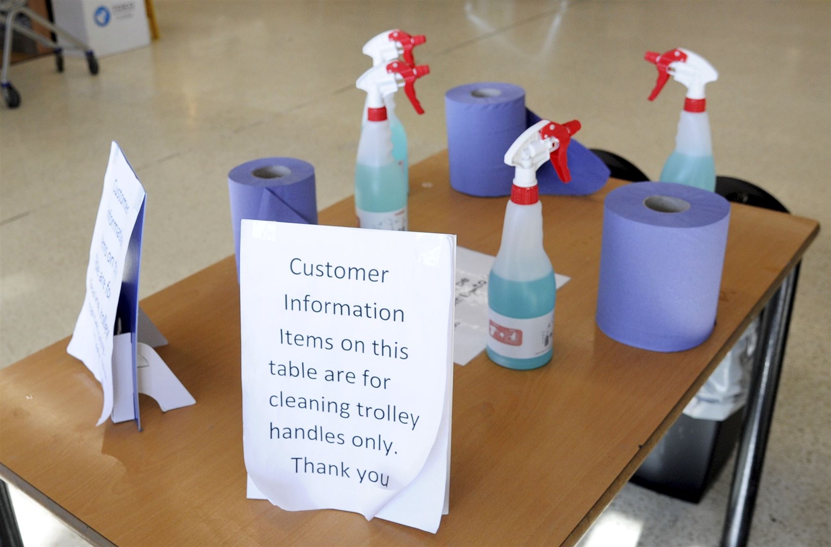 Sprays for customers to wipe down trolleys and baskets. Picture: Eric Cormack
