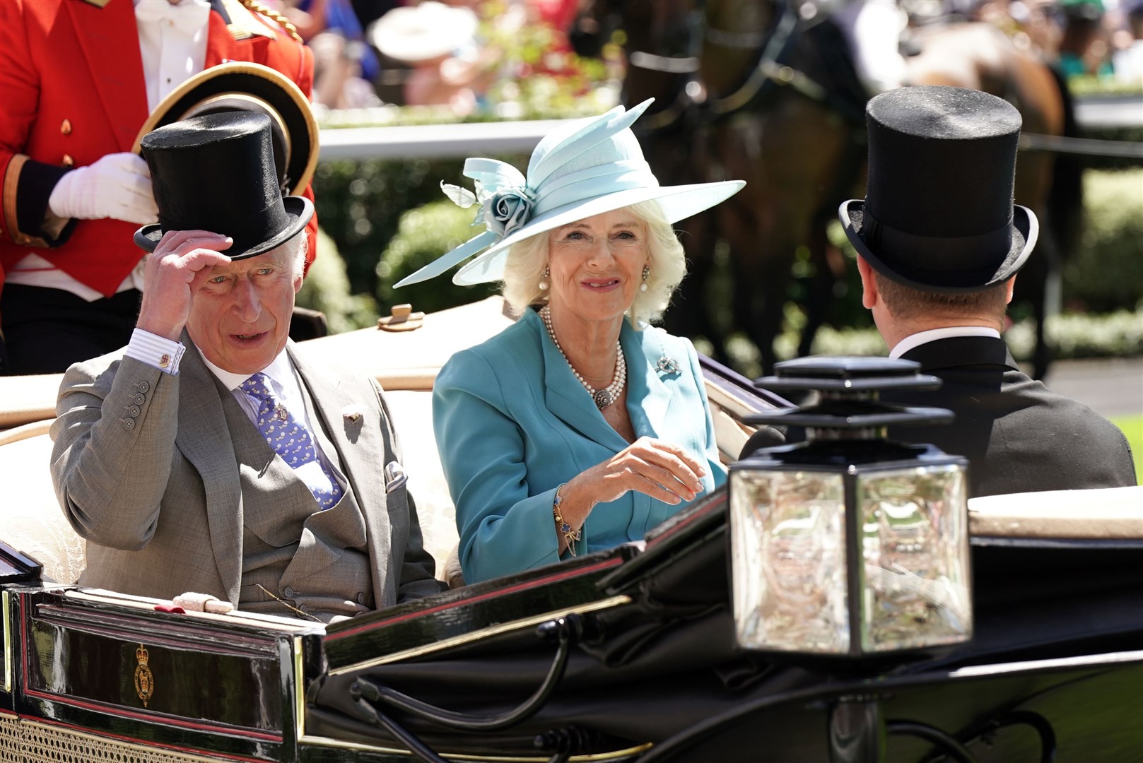 The Prince of Wales, Duchess of Cornwall and Peter Phillips arriving by carriage at Royal Ascot. Aaron Chown/PA