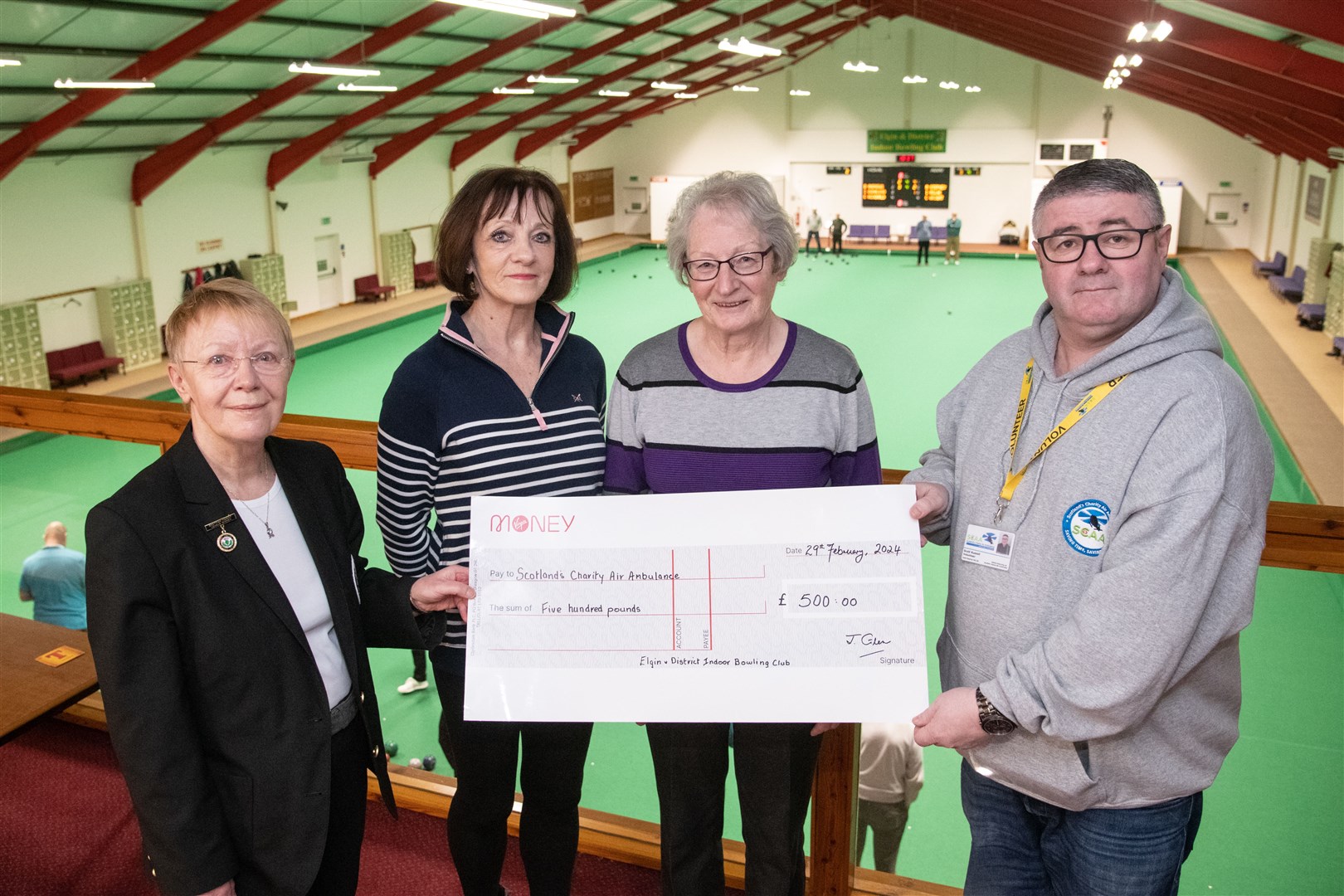 From left; Joan Glen, Christine Mclellan, Isobel Laing and Scott Russell. ..Handover of Â£500 from the Elgin Indoor Bowling Club to the Scottish Charity Air Ambulance. ..Picture: Daniel Forsyth..