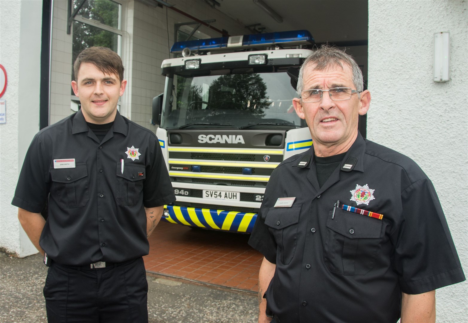 Fochabers fire station new recruit Jos Smith (left) with dad Gary who has been there 42 years...Fochabers Fire Station Recruitment Drive...Picture: Becky Saunderson. Image No.044678.