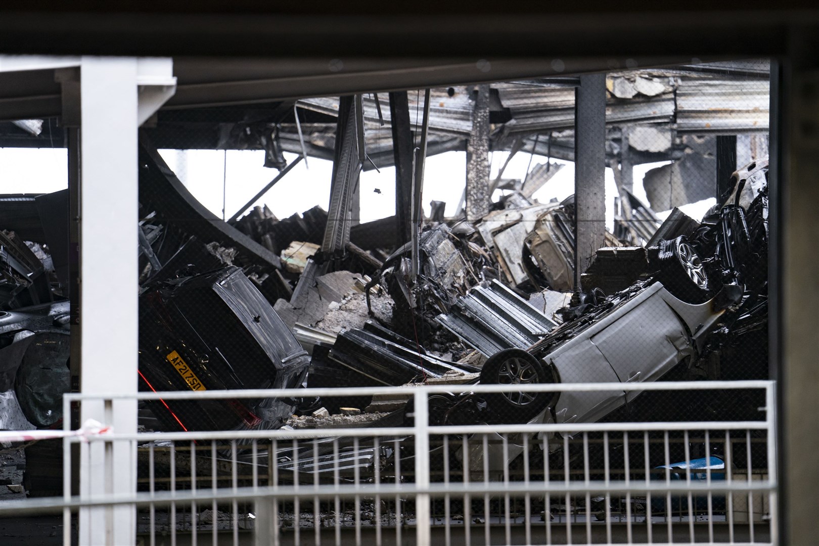 The scene at Luton Airport after a fire ripped through level three of the airport’s Terminal Car Park 2 (Jordan Pettitt/PA)