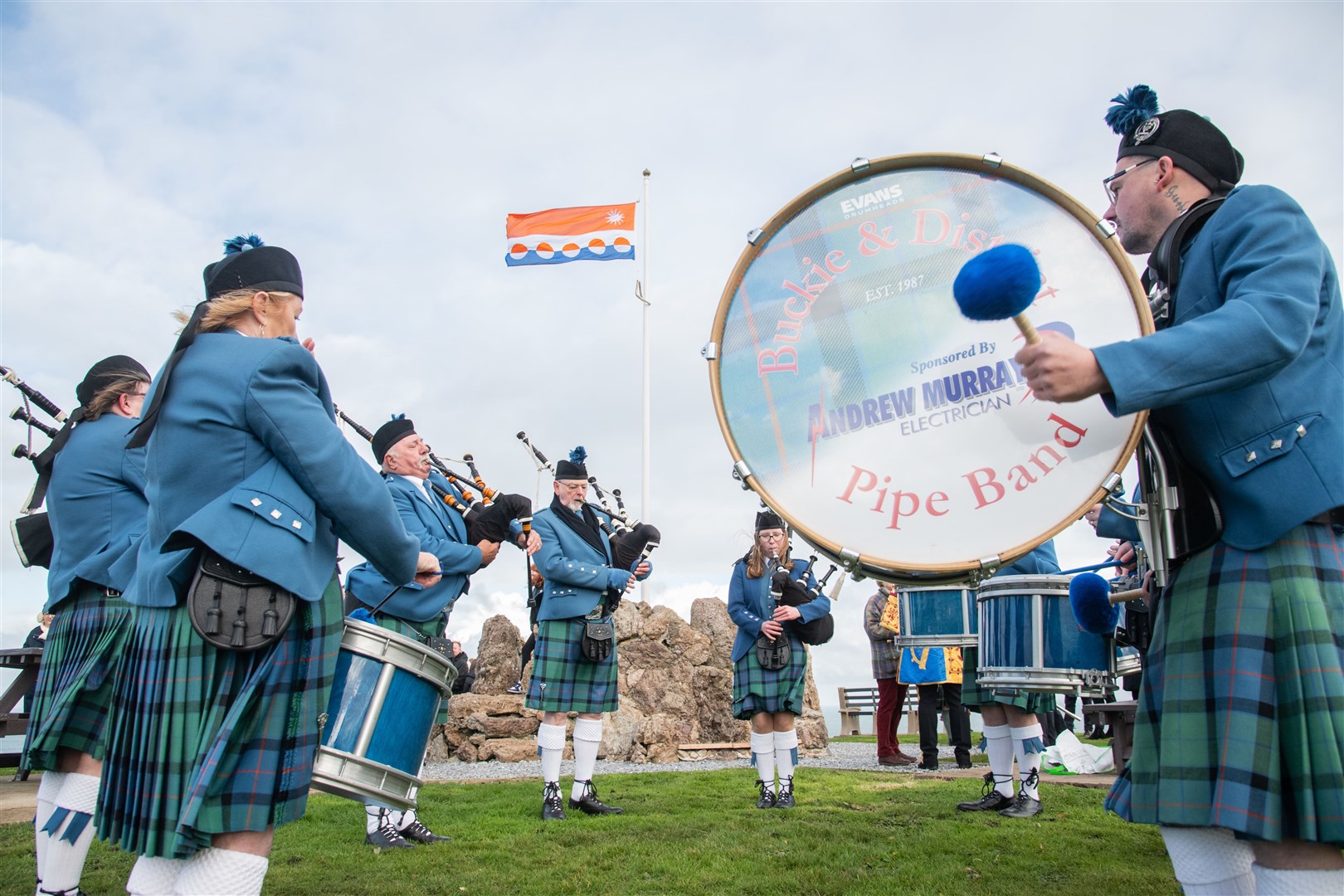 The Buckie and District Pipe Band played some stirring tunes at the ceremony. Picture: Daniel Forsyth..
