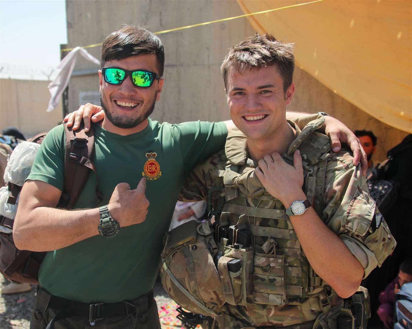 Mohammed Jawad Akbari with Captain David Kellett after being reunited in Kabul (Ministry of Defence)