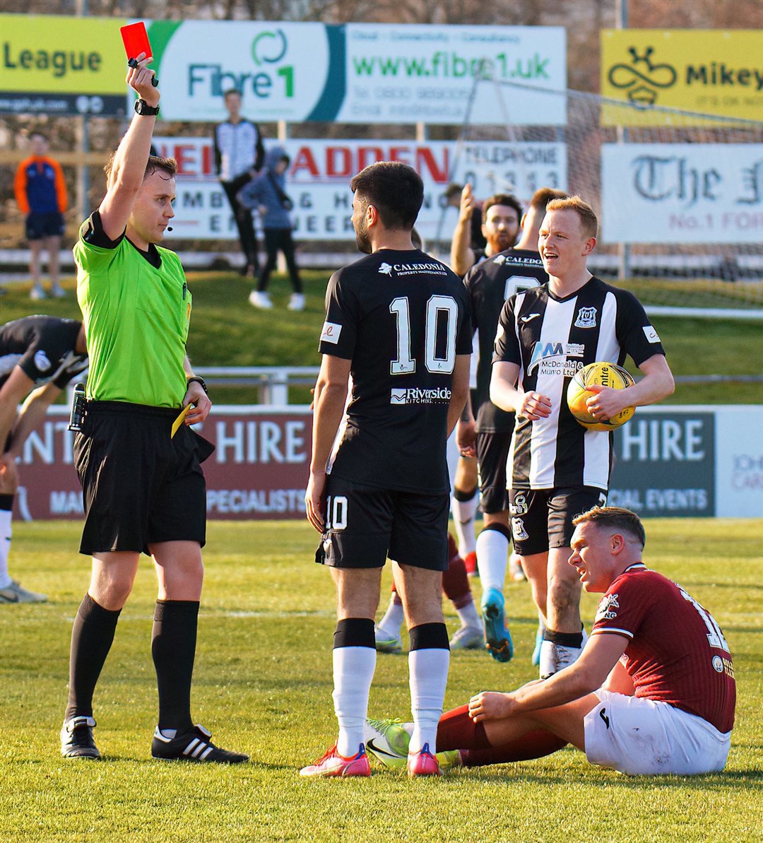 Elgin`s Rabin Omar sees red after his second yellow card. Photo: Bob Crombie