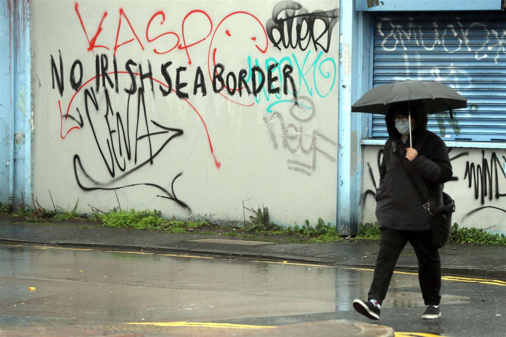 Graffiti reading ‘No Irish Sea border’ Stroud Street in Belfast (Brian Lawless/PA)