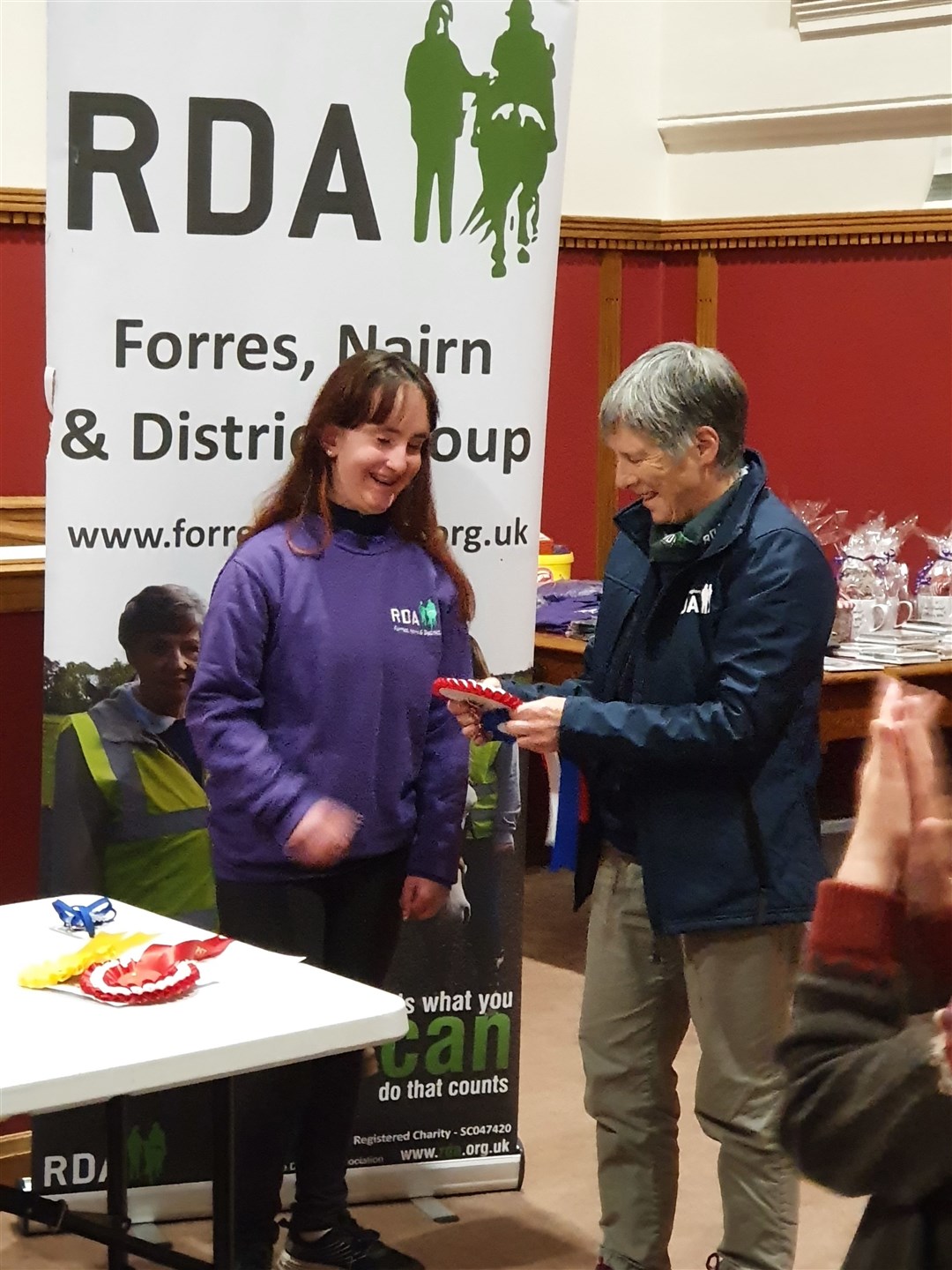Kyla receiving her rosettes from RDA Grampian and Highland Regional chairwoman, Elizabeth Furness.