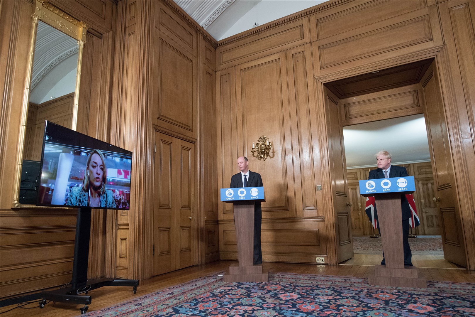 Chief medical officer Professor Chris Witty (left) and Prime Minister Boris Johnson during a virtual press conference at Downing Street, London (Stefan Rousseau/PA)