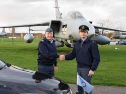 Group Captain Mark Chappell (left) hands over command of RAF Lossiemouth to Group Captain Paul Godfrey.