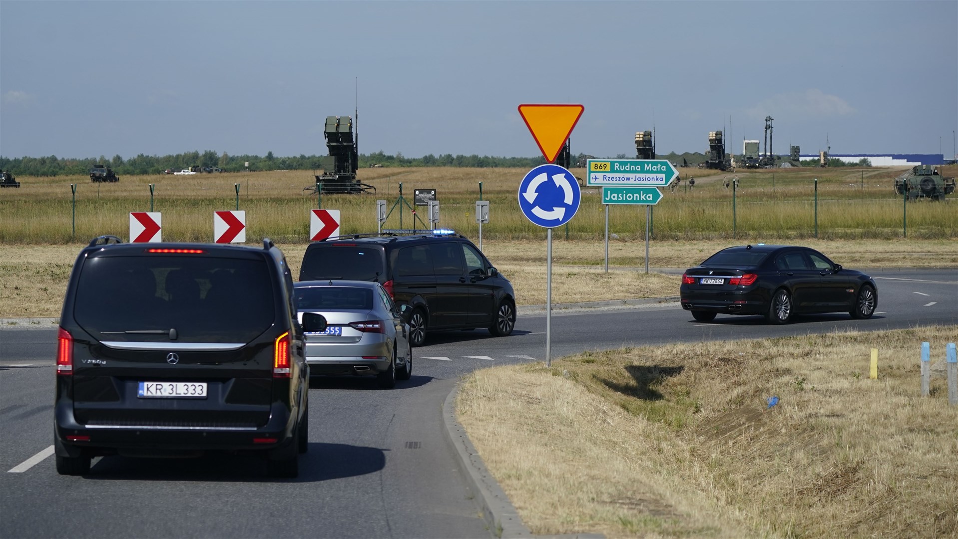 Vehicles from Taoiseach Micheal Martin’s cavalcade pass anti-aircraft defences at Rzeszow airport in Poland, after leaving Ukraine (Niall Carson/PA)