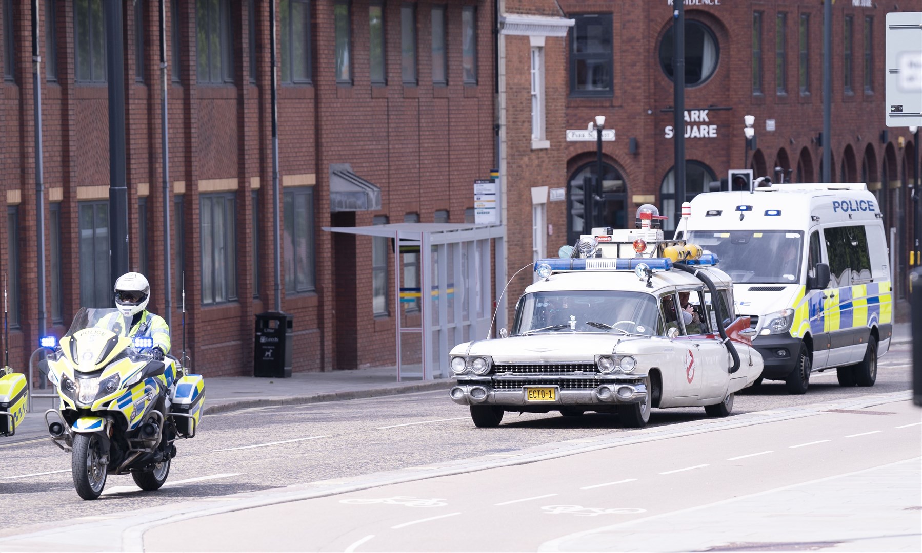 Police escort the Ghostbusters vehicle Ecto-1 (Danny Lawson/PA)