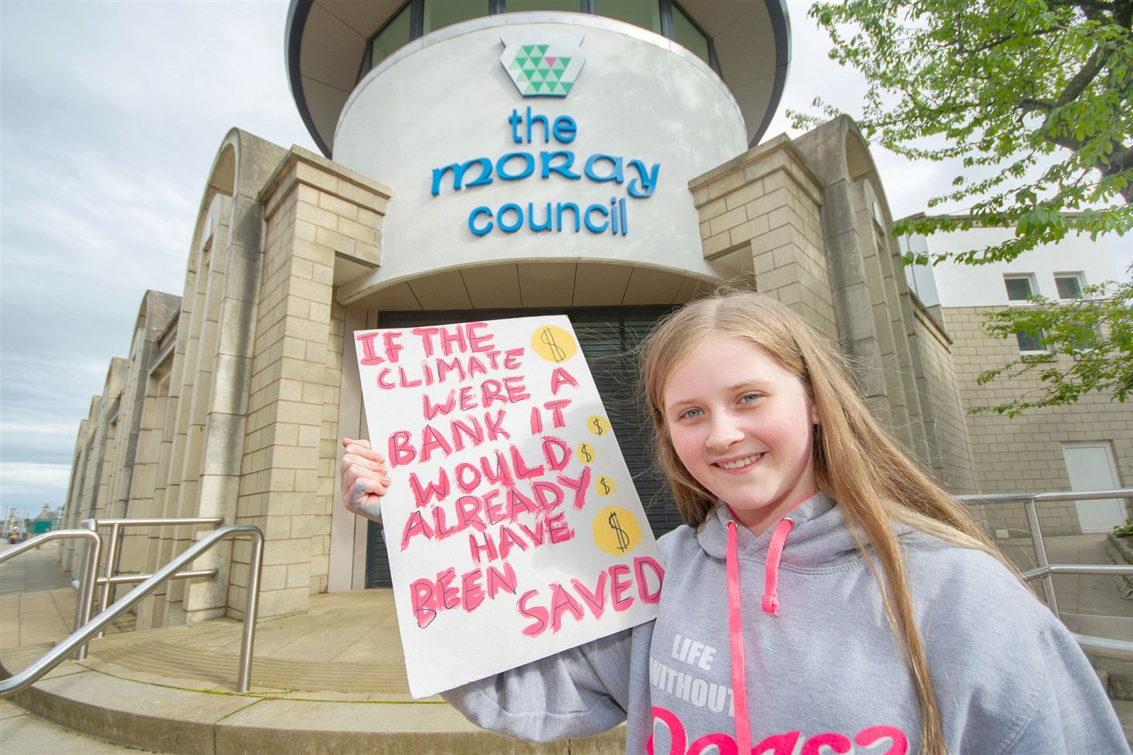 12 year old Hannah Weir is staging a climate change protest outside the Moray Council Annexe, Elgin High Street on Friday.