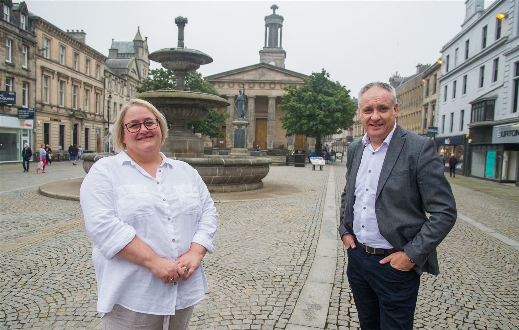 Debi Weir, who's pictured with Richard Lochhead, will attend the official opening of the Scottish Parliament on October 2. Picture: Becky Saunderson..