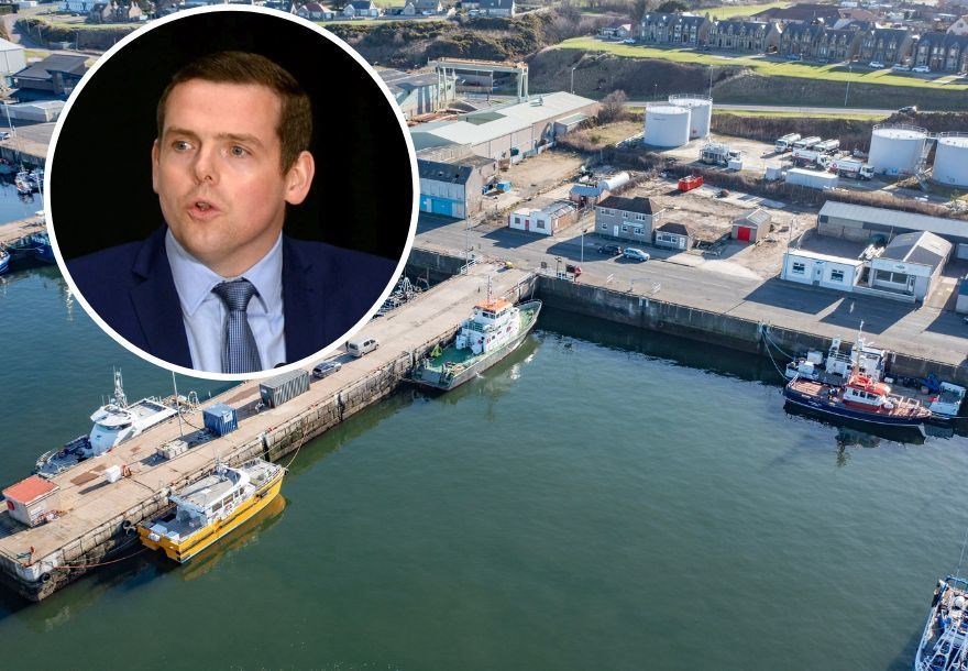 Moray Conservative MP Douglas Ross (inset) has praised the construction of the new wind farm O&M base opposite pier 3 at Buckie Harbour.