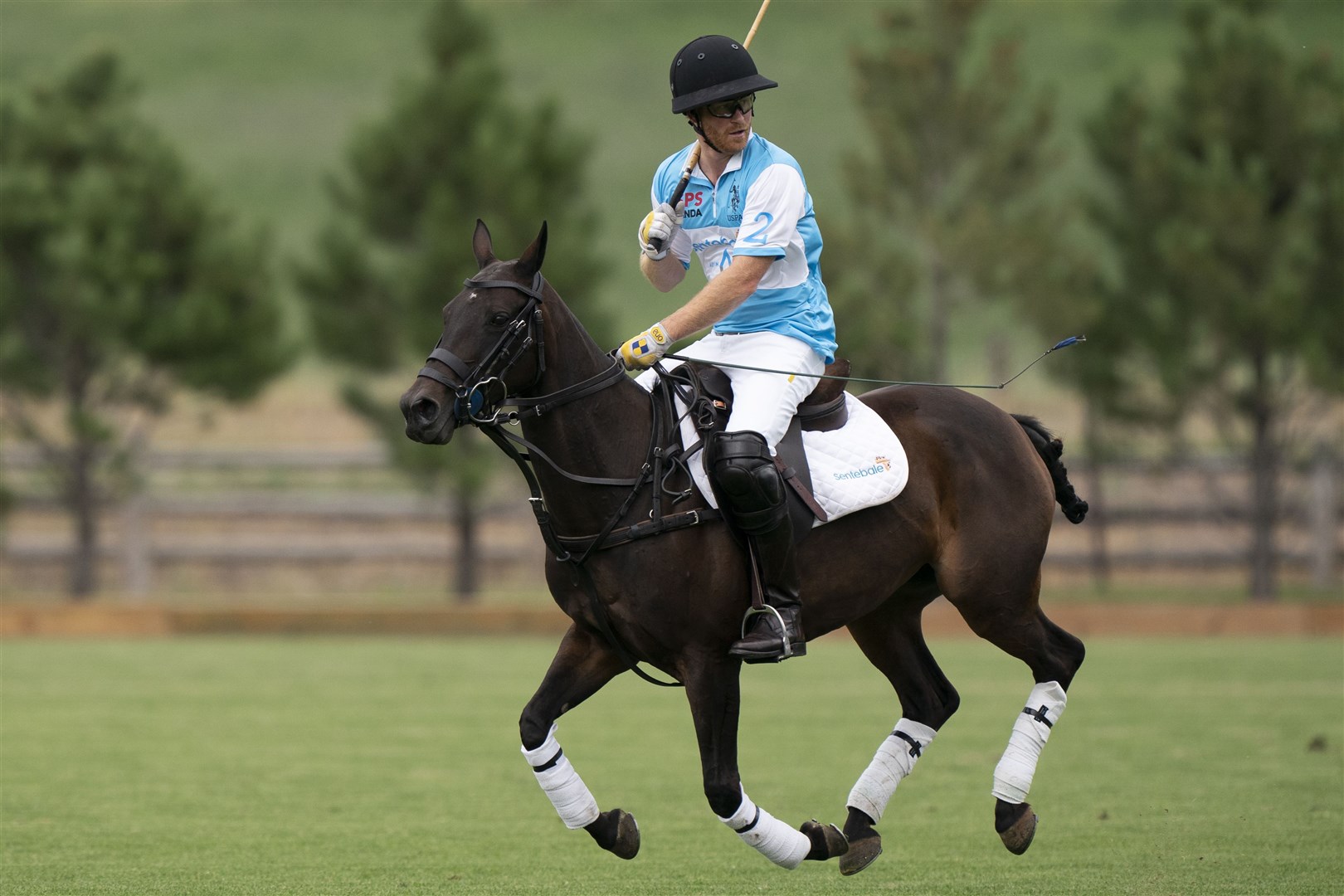 The Duke of Sussex playing in a polo fundraising match for Sentebale in 2022 (Kirsty O’Connor/PA)